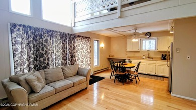 Escape to this cute-as-a-button 3-bedroom, 1-bath chalet with a on The Hideout Golf in Pennsylvania - for sale on GolfHomes.com, golf home, golf lot