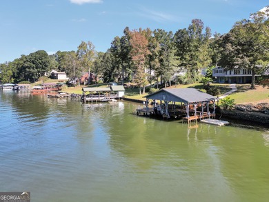 Lakefront Living in Turtle Cove!  Welcome to this stunning on Turtle Cove Golf Course in Georgia - for sale on GolfHomes.com, golf home, golf lot