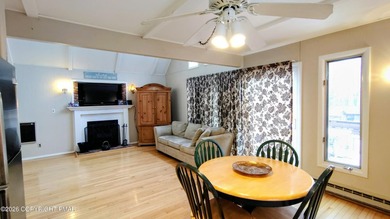 Escape to this cute-as-a-button 3-bedroom, 1-bath chalet with a on The Hideout Golf in Pennsylvania - for sale on GolfHomes.com, golf home, golf lot