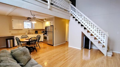 Escape to this cute-as-a-button 3-bedroom, 1-bath chalet with a on The Hideout Golf in Pennsylvania - for sale on GolfHomes.com, golf home, golf lot