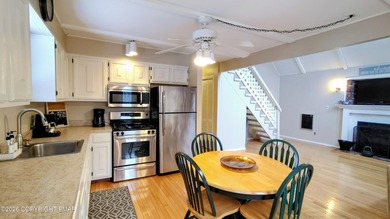 Escape to this cute-as-a-button 3-bedroom, 1-bath chalet with a on The Hideout Golf in Pennsylvania - for sale on GolfHomes.com, golf home, golf lot