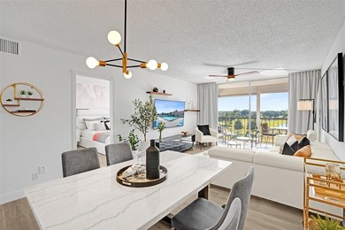 Stunningly remodeled 1 bed, 1.5 bath Penthouse condo in 55+ on Hollybrook Golf and Tennis Club  in Florida - for sale on GolfHomes.com, golf home, golf lot