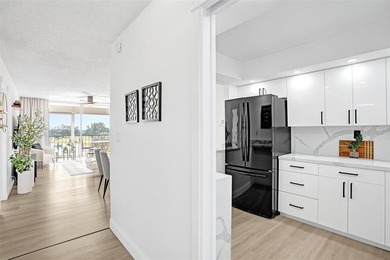 Stunningly remodeled 1 bed, 1.5 bath Penthouse condo in 55+ on Hollybrook Golf and Tennis Club  in Florida - for sale on GolfHomes.com, golf home, golf lot