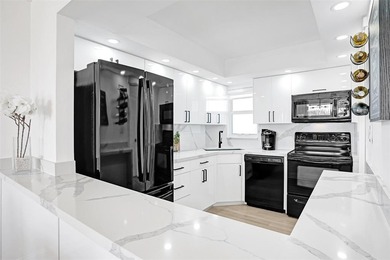 Stunningly remodeled 1 bed, 1.5 bath Penthouse condo in 55+ on Hollybrook Golf and Tennis Club  in Florida - for sale on GolfHomes.com, golf home, golf lot