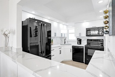 Stunningly remodeled 1 bed, 1.5 bath Penthouse condo in 55+ on Hollybrook Golf and Tennis Club  in Florida - for sale on GolfHomes.com, golf home, golf lot