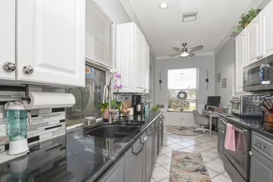 Welcome home to this beautiful 3 bedroom, 2 bath, 2 car garage on St. Lucie Trail Golf Club in Florida - for sale on GolfHomes.com, golf home, golf lot