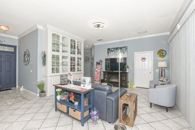 Welcome home to this beautiful 3 bedroom, 2 bath, 2 car garage on St. Lucie Trail Golf Club in Florida - for sale on GolfHomes.com, golf home, golf lot