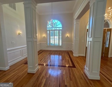 Elegant Four-Sided Brick Ranch in The Providence Club, an on The Providence Club in Georgia - for sale on GolfHomes.com, golf home, golf lot