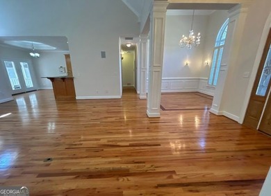 Elegant Four-Sided Brick Ranch in The Providence Club, an on The Providence Club in Georgia - for sale on GolfHomes.com, golf home, golf lot