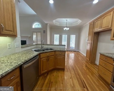 Elegant Four-Sided Brick Ranch in The Providence Club, an on The Providence Club in Georgia - for sale on GolfHomes.com, golf home, golf lot