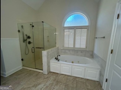 Elegant Four-Sided Brick Ranch in The Providence Club, an on The Providence Club in Georgia - for sale on GolfHomes.com, golf home, golf lot