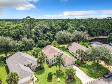 Welcome to this stunning three-bedroom, two-bath home located in on Plantation Bay Golf and Country Club in Florida - for sale on GolfHomes.com, golf home, golf lot