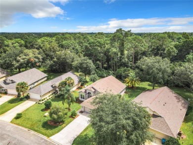 Welcome to this stunning three-bedroom, two-bath home located in on Plantation Bay Golf and Country Club in Florida - for sale on GolfHomes.com, golf home, golf lot