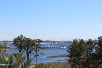 PRICE CHANGE - COME SEE THIS BEAUTIFUL WATERFRONT CONDOMINIUM! on Bay Point Resort Golf Club in Florida - for sale on GolfHomes.com, golf home, golf lot