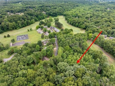 Embrace the Bella Vista bike lifestyle from this .52-acre on Bella Vista - Metfield Golf Complex and Country Club in Arkansas - for sale on GolfHomes.com, golf home, golf lot