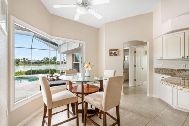 STUNNING LAKE VIEW from this elegant, ELEVATED and impeccably on Rotonda Golf and Country Club - Long Marsh  in Florida - for sale on GolfHomes.com, golf home, golf lot