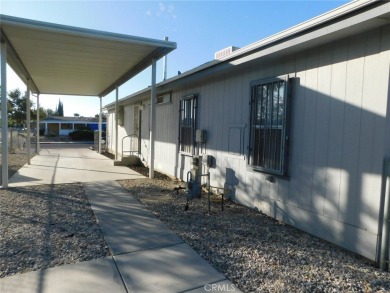 Welcome to 13804 Trinidad Dr. Victorville.  This little beauty on Green Tree Golf Course in California - for sale on GolfHomes.com, golf home, golf lot