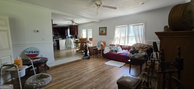 Welcome to 51 Play Golf Drive - a rare retreat just outside the on The International City Golf Course in Georgia - for sale on GolfHomes.com, golf home, golf lot