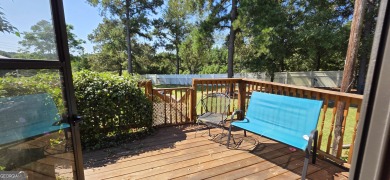Welcome to 51 Play Golf Drive - a rare retreat just outside the on The International City Golf Course in Georgia - for sale on GolfHomes.com, golf home, golf lot