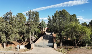 Open your private gated bridge to enter this beautiful oasis on Oakcreek Country Club in Arizona - for sale on GolfHomes.com, golf home, golf lot