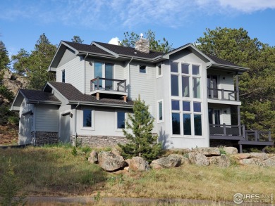 Picturesque & Stylish 2 Story Home just off the 17th Fairway of on Fox Acres Country Club in Colorado - for sale on GolfHomes.com, golf home, golf lot