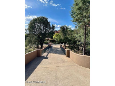Open your private gated bridge to enter this beautiful oasis on Oakcreek Country Club in Arizona - for sale on GolfHomes.com, golf home, golf lot