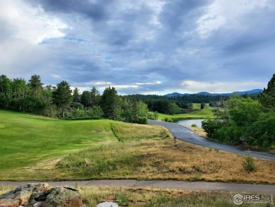 Picturesque & Stylish 2 Story Home just off the 17th Fairway of on Fox Acres Country Club in Colorado - for sale on GolfHomes.com, golf home, golf lot