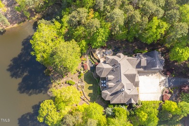 Lake Views! As the sun rises over the serene lake, it gently on Governors Club in North Carolina - for sale on GolfHomes.com, golf home, golf lot