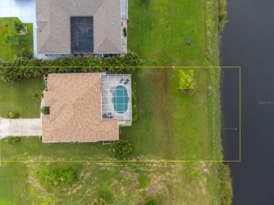 STUNNING LAKE VIEW from this elegant, ELEVATED and impeccably on Rotonda Golf and Country Club - Long Marsh  in Florida - for sale on GolfHomes.com, golf home, golf lot
