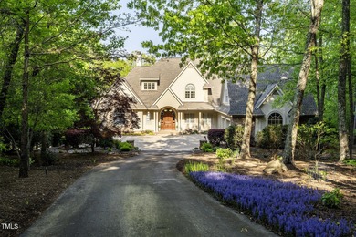 Lake Views! As the sun rises over the serene lake, it gently on Governors Club in North Carolina - for sale on GolfHomes.com, golf home, golf lot