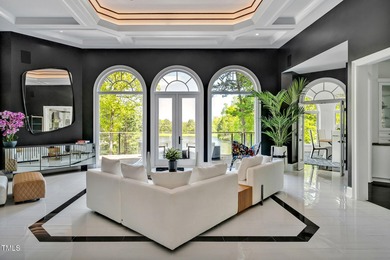 Lake Views! As the sun rises over the serene lake, it gently on Governors Club in North Carolina - for sale on GolfHomes.com, golf home, golf lot