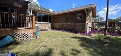 Welcome to 51 Play Golf Drive - a rare retreat just outside the on The International City Golf Course in Georgia - for sale on GolfHomes.com, golf home, golf lot