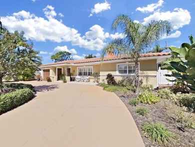 A Spacious Tropical Oasis located in Pasadena Golf Club Estates on Pasadena Yacht and Country Club in Florida - for sale on GolfHomes.com, golf home, golf lot