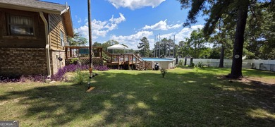 Welcome to 51 Play Golf Drive - a rare retreat just outside the on The International City Golf Course in Georgia - for sale on GolfHomes.com, golf home, golf lot