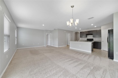 This charming 4-bedroom, 2-bathroom single-family home is on Highlands Reserve Golf Club in Florida - for sale on GolfHomes.com, golf home, golf lot
