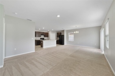 This charming 4-bedroom, 2-bathroom single-family home is on Highlands Reserve Golf Club in Florida - for sale on GolfHomes.com, golf home, golf lot