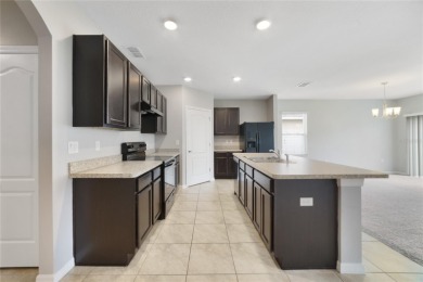 This charming 4-bedroom, 2-bathroom single-family home is on Highlands Reserve Golf Club in Florida - for sale on GolfHomes.com, golf home, golf lot
