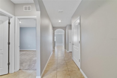 This charming 4-bedroom, 2-bathroom single-family home is on Highlands Reserve Golf Club in Florida - for sale on GolfHomes.com, golf home, golf lot