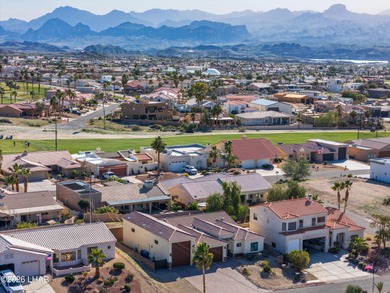 Beautiful RV Garage Home Near the Golf Course! This like-new on London Bridge Golf Course in Arizona - for sale on GolfHomes.com, golf home, golf lot