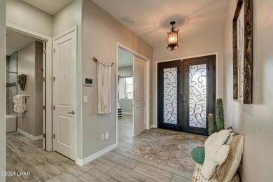 Excellent location and loaded with features! Across the street on London Bridge Golf Course in Arizona - for sale on GolfHomes.com, golf home, golf lot