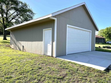 Incredible home nestled in the lake Ridge Subdivision and golf on Lake Perry Country Club in Kansas - for sale on GolfHomes.com, golf home, golf lot
