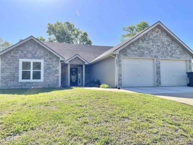 Incredible home nestled in the lake Ridge Subdivision and golf on Lake Perry Country Club in Kansas - for sale on GolfHomes.com, golf home, golf lot