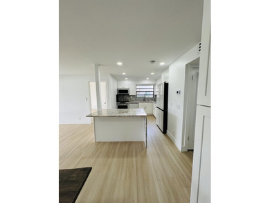 A very rare opportunity to own a first floor waterfront Isle of on Kings Point Golf -Flanders Way in Florida - for sale on GolfHomes.com, golf home, golf lot