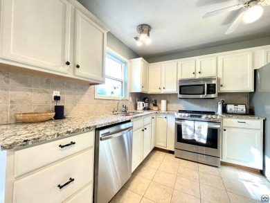 Incredible home nestled in the lake Ridge Subdivision and golf on Lake Perry Country Club in Kansas - for sale on GolfHomes.com, golf home, golf lot