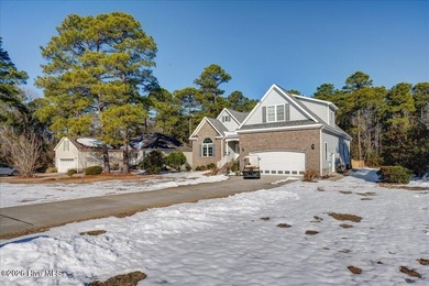 Welcome to 2022 Caracara Drive, where refined finishes meet on Harbour Point Golf Club in North Carolina - for sale on GolfHomes.com, golf home, golf lot