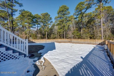 Welcome to 2022 Caracara Drive, where refined finishes meet on Harbour Point Golf Club in North Carolina - for sale on GolfHomes.com, golf home, golf lot