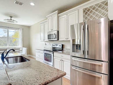 Welcome to easy living in the heart of Daytona Beach Grande on LPGA International Golf Course in Florida - for sale on GolfHomes.com, golf home, golf lot