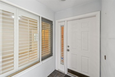 Welcome to one of the desirable homes in the Villas at on Feather Sound Country Club in Florida - for sale on GolfHomes.com, golf home, golf lot