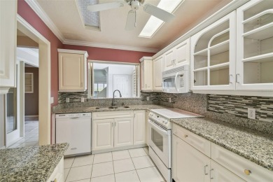 Welcome to one of the desirable homes in the Villas at on Feather Sound Country Club in Florida - for sale on GolfHomes.com, golf home, golf lot