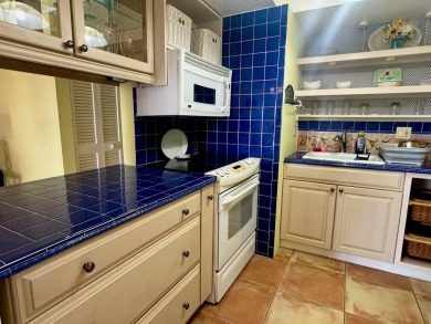 This 2nd-floor corner Riverhouse unit offers the perfect blend on Rotonda Golf and Country Club The Hills Course in Florida - for sale on GolfHomes.com, golf home, golf lot